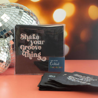 Shake Your Groove Thing Silver Glitter Foil Cocktail Napkin - Holt x Palm -  Get ready to shake things up with our Shake Your Groove Thing Silver Glitter Foil Cocktail Beverage Napkin! Set of 20 boxed napkins makes it perfect for gift giving or convenient storage. Add a touch of shimmer and style to any 70's disco theme party or event. Let your guests groove and enjoy their drinks in style with these sparkling, high-quality napkins. Made in the USA Set of 20 Boxed Napkins Approx 5x5 inches