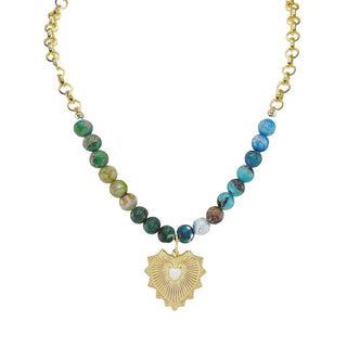 The "Niki" Gemstone x White Opal Heart Necklace - Green, Blue, Brown - Holt x Palm -  Adorable!!! Earth toned gemstones are paired with gold and a center opal to make a very cute statement necklace. It has some boho vibes, rocker vibes and lots of glam. The white opal is said to promote positive manifestation and can aid in recovering from heartbreak, and it looks pretty cute too! The stunning gold fan heart with the opal compliments this necklace beautifully.