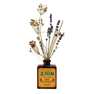 Zion National Park Botanical Floral Reed Diffuser - Holt x Palm -  Notes of desert lavender and dried herbs. Experience Zion€™s peaceful landscape with calming desert lavender and subtle notes of dried herbs. This soothing, natural fragrance evokes sun-warmed red rocks and quiet canyons, bringing the serenity of the Southwest indoors without the need for a flame. Rattan reeds with preserved white star fern, pink larkspur & pink button flowers. 4 fl oz. Lasts up to 6 months.