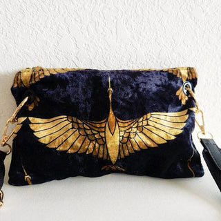 Small Black and Gold Heron Crossbody Bag - Holt x Palm -  The Black and Gold Heron Crossbody Bag is a beautiful piece to add on your hip. It's slightly smaller than the larger version however still packs a punch. The vintage vibes and crushed velvet exterior offer a touch of elegance, while the large inside pocket and gold velvet lining provide practicality. Made with high-end swivel hardware and an Italian metal zipper closure for a sophisticated finish. *Dimensions approximately 6" H x 9.5" W.