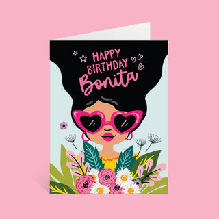 Happy Birthday Bonita - Holt x Palm -  Celebrate the special person in your life with Happy Birthday Bonita! This playful card is the perfect way to wish them a happy birthday. The vibrant design and quirky language will bring a smile to their face. (No need for a boring, traditional card!) • Single A2 Folded Card [Size: 4 1/4 x 5 1/2"] • A2 Pink Envelope [Size: 4 3/8 x 5 3/4 in.] • Blank Inside