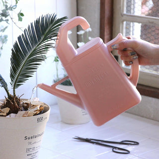 Hook Watering Can 1.7L: Smoke Pink - Holt x Palm -  Clever in shape, this is not your typical watering can! The lightweight Hook Watering Can is perfect for watering indoor/outdoor plants and flowers. Ideal for small spaces, the narrow/thin profile offers a small footprint for easy storage. When not in use, simply hook on an outdoor faucet or railing. Dimensions: w10" d3" h11" Volume: 1.7L