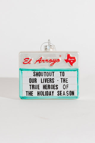 Holiday Heroes Ornament - - Holt x Palm -  This one of a kind ornament is sure to be a festive hit! Made from mercury glass, this marvelous marquee adds a touch of humor to your tree that can be treasured for years to come. - SIZE: 4.5"W x 1 9/16"D x 3.5"H - Collectible mercury glass ornament - Packaged in a gift-ready box