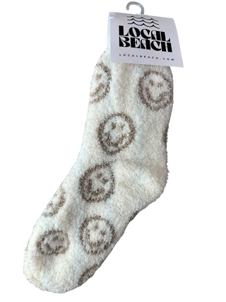 Smiley Local Beach Cozy Socks - Holt x Palm -  Introducing the Local Beach Cozy Sock Collection. Warm and Fuzzy incredibly cozy crew slipper socks. Feather Knit construction with an ultra soft hand. Perfect for home, travel, and beyond. Cozy up and stay warm with the softest socks ever. Buy the set and save! • 100% Polyester Microfiber • One Size Fits Most • No fading, shed free Care: Machine Wash Cold, Gentle Cycle. Air or tumble dry low