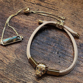 Gold Filled Leopard Adjustable Bracelet - Holt x Palm -  This Gold Filled Leopard Adjustable Bracelet features a striking leopard focal, adding a touch of boldness to any outfit. The adjustable design allows for a custom fit, while the gold filling provides gorgeous elegance. Make a statement with this unique and versatile piece.