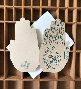 Thanks Hand Card - Holt x Palm -  Hands down, you're the best- thank you! A hand shaped card inspired by antique hand lettered shop signs. • blank inside and measures 4.25”x5.5” folded • shaped folded card is letterpress printed in teal blue ink on 100# smooth kraft/brown paper • die cut • accompanied by an patterned A2 envelope and packaged in a clear sleeve