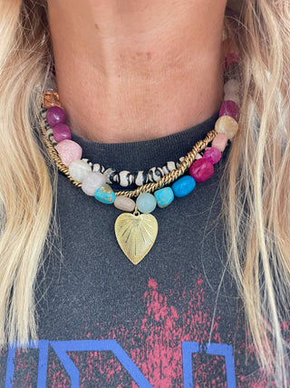 Halona Necklace - Holt x Palm -  Multi stone necklace- each one is unique in a combination of natural gemstones and minerals, with a gold filled sunburst heart pendant. Total necklace length 16”, pendant measures 1” in length. All gold filled findings.