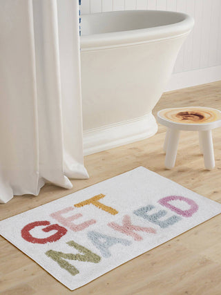 GET NAKED! Bath Mat - Handtufted - Holt x Palm -  Get ready to get naked (on your feet at least) with our fun bath mat! Perfect for adding some playfulness to your bedroom or bathroom. Who says getting clean can't be fun?! SIZE : 20 X 30 Inches// 51 X 76 CM SHAPE : Rectangular Color : Multi Colors Material : Soft Hand Spun Cotton MAKING :