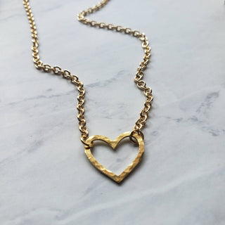 Gold Hammered Heart charm Necklace - Holt x Palm -  a more petite version of the BIG Heart Necklace. featuring a .75" hammered brass heart charm adjustable 17" gold plated brass cable chain. great for layering