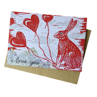 I Love You Bunny - Holt x Palm -  I love you bunny Show some bunny you love them with this card. Reproduced from an original mixed-media block print by ilikesara / Sara Schalliol-Hodge, which features collaged map mountains, text clouds, and linocut printing. -Card measures 4.25" x 5.5" when folded -Printed on 100 lb cream cover paper -Kraft envelope included-Blank interior-Packaged in a clear cellophane sleeve