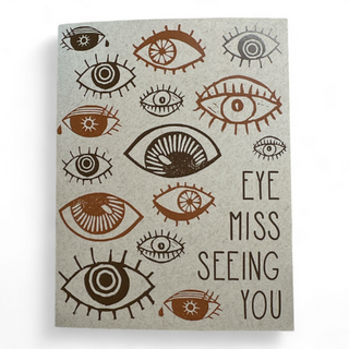 Eye Missing Seeing You - Holt x Palm -  Eye miss seeing you based on blockprints by ilikesara / Sara Schalliol-Hodge -card measures 4.25" x 5.5" when folded -printed on 100 lb light kraft cover paper -white envelope included -blank interior -shipped in a clear cellophane sleeve inside a rigid cardboard mailer