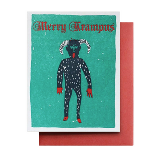 Merry Krampus - Holt x Palm -  Send holiday greetings with a twist using our Merry Krampus card. This quirky design featuring Krampus, the Christmas demon, is sure to bring some laughter to your loved ones. Don't be afraid to be a little naughty this season! Letterpress printed on 110lb recycled white paper Blank inside Card size: 4.25" x 5.50" (folded).