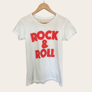 Rock & Roll Women's Tee - Holt x Palm -  Immerse in the spirit of rebellion and freedom with the Rock & Roll Women's Tee in vibrant white/red from Bandit Brand. This screen-printed tee, featuring a bold graphic pattern, is not just an item of clothing - it's a statement. When you choose this tee, you're not just embracing an iconic style, but also contributing to the restoration of historic properties. It's more than fashion; it's a cause.