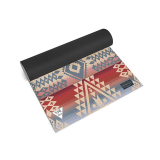 Canyonlands Yoga Mat by Pendleton - Holt x Palm -  Elevate your fitness routine with this lightweight, cushioned yoga mat in an exclusive Pendleton pattern. It features a soft ridged top with a firmer ridged bottom for sure grip on any surface. Durably constructed from high-quality PER (polymer environmental resin) and eco-friendly materials that are free of phthalate, latex and heavy metals. Designed in Portland, Oregon. 24"W x 72"L; 5mm thick 2½" lbs. Wipe clean Imported