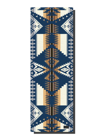 Eagle Rock Tan Yoga Mat by Pendleton - Holt x Palm -  Elevate your fitness routine with this lightweight, cushioned yoga mat in an exclusive Pendleton pattern. It features a soft ridged top with a firmer ridged bottom for sure grip on any surface. Durably constructed from high-quality PER (polymer environmental resin) and eco-friendly materials that are free of phthalate, latex and heavy metals. Designed in Portland, Oregon. 24"W x 72"L; 5mm thick 2½" lbs. Wipe clean Imported