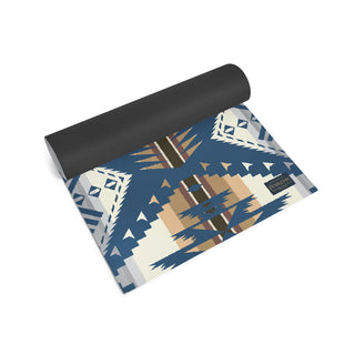 Eagle Rock Tan Yoga Mat by Pendleton - Holt x Palm -  Elevate your fitness routine with this lightweight, cushioned yoga mat in an exclusive Pendleton pattern. It features a soft ridged top with a firmer ridged bottom for sure grip on any surface. Durably constructed from high-quality PER (polymer environmental resin) and eco-friendly materials that are free of phthalate, latex and heavy metals. Designed in Portland, Oregon. 24"W x 72"L; 5mm thick 2½" lbs. Wipe clean Imported