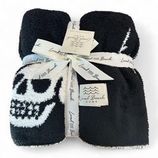 Skull & Bolt Luxe Home Blanket - Holt x Palm -  Introducing the Local Beach Home Collection featuring luxurious and incredibly cozy XL blankets. Reversible 100% Feather Knit construction with an ultra soft hand. Perfect for home, travel, and beyond. Cozy up and stay warm with the softest blanket ever. White Front // Black Back • 100% Polyester Microfiber XL Blanket, Double layer 54" W x 72" L No fading, shed free Care: Machine Wash Cold, Gentle Cycle. Air or tumble dry low