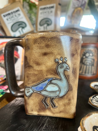 Hand Painted Rustic Peacock Stoneware Square Mug - Holt x Palm -  This Mara mug design is a great way to start your day and hails from our popular hand-etched, glazed and finished mug collection! 4 inches tall and holds up to 12 oz. Microwave and dishwasher safe, with lead-free paint. Made in Mexico.