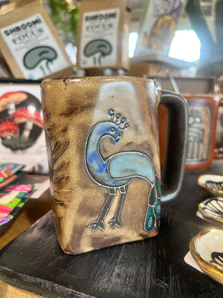 Hand Painted Rustic Peacock Stoneware Square Mug - Holt x Palm -  This Mara mug design is a great way to start your day and hails from our popular hand-etched, glazed and finished mug collection! 4 inches tall and holds up to 12 oz. Microwave and dishwasher safe, with lead-free paint. Made in Mexico.