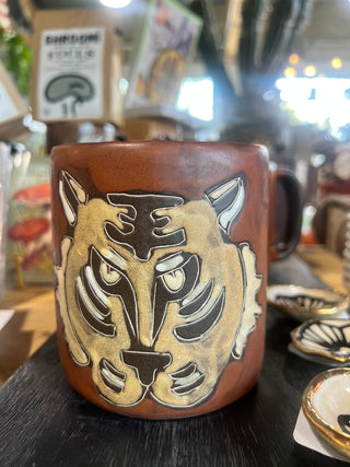 Rusitc Hand Painter Stoneware Tiger Mug - Holt x Palm -  Channel your inner tiger! Appreciate handcrafted goodness every morning with this amazing piece of art... 4.5 inches tall and holds up to 16 oz. Microwave and dishwasher safe, with lead-free paint. Made in Mexico.