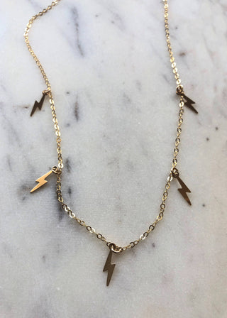 Sheryl Necklace - Holt x Palm -  Fun shiny lightning blot charms on delicate gold necklace. Total necklace length 16", all 14k gold filled materials.