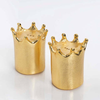 Crown Salt & Pepper Set - Holt x Palm -  Details Dimensions : 3"H x 2.5"W x 2.5"L Finishes : Gold Material : Aluminum Use and Care * Given its handmade and hand-finished nature, variations in the piece are to be expected and celebrated. * No two pieces are exactly alike. * Food safe * Hand wash with mild soap, water, and towel dry. * Do not use abrasives or chemicals to clean the metal as it may scratch and discolor * Not dishwasher safe * Will not tarnish