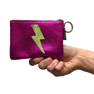 The Cutest Up-Cycled Leather Lightening Bolt Pouch You Ever Did See.... - Holt x Palm -  We love these little pouches!! They just keep your purse organized in style. Use them for Airpods, cash, ID, pills, whathaveyou! It's your little good time pouch...attach it to your purse or just your belt buckly and go out and have you a good 'ol time! Buy a few for friends...they will adore them! DETAILS: Measures 5"x3.5". Unlined. Brass zipper and key ring Appliques are hand cut and attached with mini rivets.