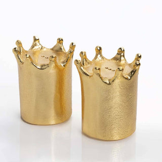 Crown Salt & Pepper Set - Holt x Palm -  Details Dimensions : 3"H x 2.5"W x 2.5"L Finishes : Gold Material : Aluminum Use and Care * Given its handmade and hand-finished nature, variations in the piece are to be expected and celebrated. * No two pieces are exactly alike. * Food safe * Hand wash with mild soap, water, and towel dry. * Do not use abrasives or chemicals to clean the metal as it may scratch and discolor * Not dishwasher safe * Will not tarnish