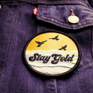 Stay Gold- Iron On Patch - Holt x Palm -  Stay gold! Or, at least try. If you've lost your gold, just use this patch to remind others not to lose theirs. It's the responsible thing to do. Iron-on patch, measures 3 inches round.