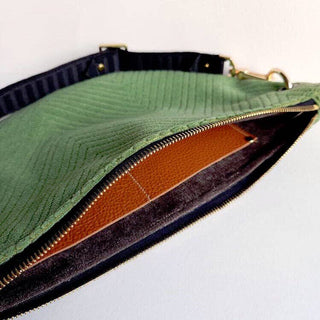 Vintage Green Chevron Velvet Fanny Bag - Holt x Palm -  Carry your essentials in style with the fashionable Vintage Green Chevron Velvet Fanny Bag. Crafted with luxe velvet and lined with grey velvet, this trendy bag boasts wallet slots and a comfy stretch strap with hardware swivel allowing you to wear it as a sling or waist. Upgrade your wardrobe with this versatile and eye-catching accessory. * Velvet Lining * Dimensions Approximately 6.7.5"H x 11.5” W * Zipper Closure * Made in the USA