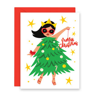 Christmas Tree Girl - box set w/8 holiday cards - Holt x Palm -  Boxed set of 8 cards and red envelopes. Packaged on eco friendly kraft box with window. €¢ Cards are 4 1/4" x 5 1/2", Folded €¢ Blank Inside €¢ White Matte Card Stock €¢ Red Envelopes * Back of cards shows matching design detail + suggestion to repurpose/store cards ** Also available as single cards Holiday card boxed set, Fun Christmas card, Latina owned.