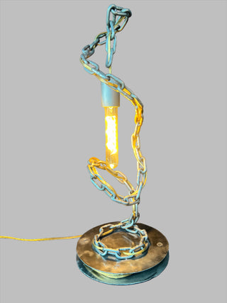 Spinal Lamp - Holt x Palm -  Add some quirky light to your room with the Spinal Lamp! This one-of-a-kind chain lamp is hand made and features a touch to turn on and brighten. Measuring 23" x 9.5", it's the perfect mix of function and fun.