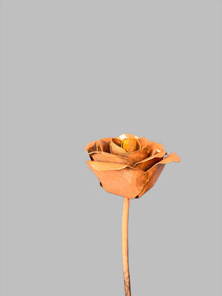 Metal Rose - Holt x Palm -  This handmade metal rose is truly one of a kind, and it's built to last forever! With its unique design and cool aesthetic, it's sure to make a statement in any space. Get ready to wow your friends with this cool twist on a traditional flower.