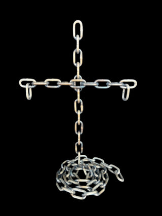 Chained Cross - Holt x Palm -  Get ready to elevate your style with our one-of-a-kind Chain Cross. Handmade with intricate chain work, this 18-inch statement piece is a true work of art. Stand out from the crowd with this unique and eye-catching decor. (No two are alike!)