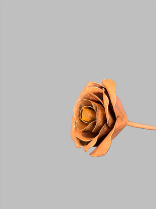 Metal Rose - Holt x Palm -  This handmade metal rose is truly one of a kind, and it's built to last forever! With its unique design and cool aesthetic, it's sure to make a statement in any space. Get ready to wow your friends with this cool twist on a traditional flower.