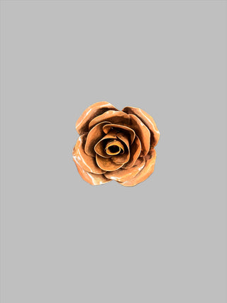 Metal Rose - Holt x Palm -  This handmade metal rose is truly one of a kind, and it's built to last forever! With its unique design and cool aesthetic, it's sure to make a statement in any space. Get ready to wow your friends with this cool twist on a traditional flower.