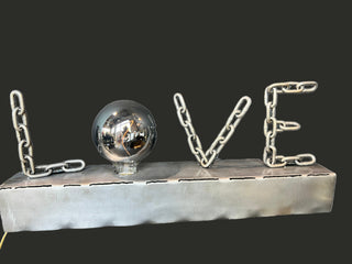 Love Lamp - Holt x Palm -  Introducing the Love Lamp - bringing a touch of handmade metal work and a whole lotta love to your space. Simply tap to illuminate and bask in its warm glow. Perfect for adding a cozy and unique touch to any room. Share the love and light up your life with the Love Lamp! 25" x 3.5" x 4.5"