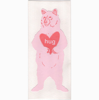 Bear Hug Gift Card - Holt x Palm -  What better way to say "be my valentine" but with a bear hug. The Grizzly Bear is the largest predator in Yellowstone. She's feared, celebrated, and once fed at the dump. This card is our homage to this beautiful creature. • flat shaped card is letterpress printed in red ink on 100# pink paper • measures approximately 3.5”x8” • die cut, & cut to hold a gift card, money, tickets, or a love note • accompanied by a #10 envelope and packaged in a clear sleeve Go wild!