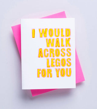 Walk Across Legos - Holt x Palm -  Now, this is true love cuz those little suckers hurt! Hand drawn type, Printed on beautiful 100% cotton paper, fluffy and yummy to write on. The cotton used is left over from the garment industry so it's recycled and earth friendly! Inside greeting: blank. A2 size, paired with a neon pink envelope. Packaged in a clear sleeve.