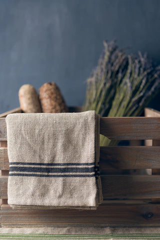 Thieffry Monogramme Black Napkins - Holt x Palm -  Traditionally crafted Belgian linen napkin. Natural linen with woven stripe detail in black. Comes in sets of 6! Up the ante at dinner with these Thieffry Monogramme Black Napkins! Taking the classic cloth napkin up a notch, these sassy linens feature a black monogramme detail to spice up your table setting. No one will be ‘napkin’ around when you’re around! (Pun intended!)