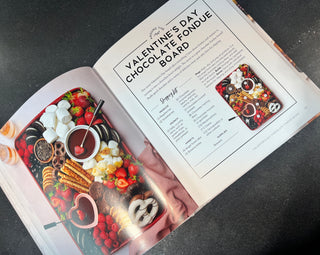 AROUND THE BOARD - Holt x Palm -  Take your charcuterie skills to the next level with this one! There is a board for every season and for every occasion in this book. Amaze your friends or family with the new adult skill of hosting the perfect gathering with adult snacks.