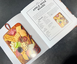 AROUND THE BOARD - Holt x Palm -  Take your charcuterie skills to the next level with this one! There is a board for every season and for every occasion in this book. Amaze your friends or family with the new adult skill of hosting the perfect gathering with adult snacks.