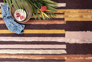 Meadow Wool Rug by Justina Blakeney x Loloi - Holt x Palm -  Artisanal striped wool rug with heavy bohemian and eclectic vibes. Shown here is the patchwork striped design with a palette of rusty reds, gold, and earthy brown tones. The tassels are everything!!! Rug can double as a wall tapestry, layered on top of a jute rug, or laid just on its' own.... Hooked 62% Wool | 38% Rayon Pile Made in India 7'-9" X 9'-9"