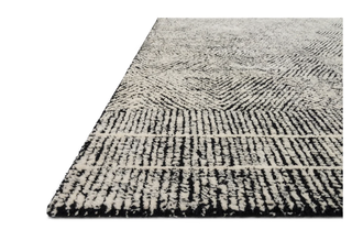 The Kopa in Black/Ivory - Holt x Palm -  With stunning and delicate linear patterns, the Kopa Collection provides an energetic and fresh canvas for a low profile, long-lasting 100% wool rug. Each design is hand tufted by skilled artisans in India. Crafted by Loloi for ED Ellen DeGeneres. 8 x 10 Material: Hand Tufted 100% Wool Pile Height: 0.5in Cotto/Canvas backing Made in India