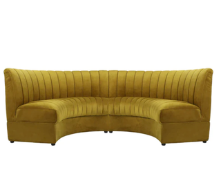 The Circular Sofa - Holt x Palm -  Bored of beige? Meet the Circular Sofa in a fun mustard color, a comfy corner for your most daring decor dreams! Punch up your living space with this mustardy marvel: curved for comfort and dining seating for style, it's the upholstered upgrade your home's been needing. Don't settle for basic - get cozy with the Circular! (Pre-order only. Allow 1-2 weeks for delivery) 96'' x 52'' x 36''