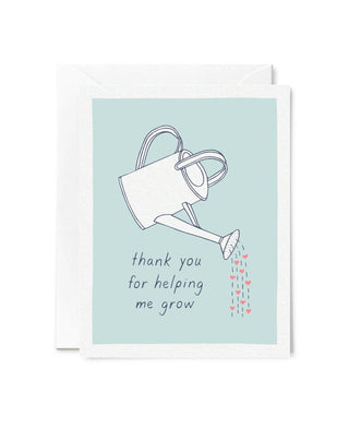 Thank You for Helping Me Grow Card - Holt x Palm -  Perfect for moms, dads, and anyone who's helped you get to where you are. • Blank inside for your personal message • Flat printed • Size: A2 folded card, 4 1/4" x 5 1/2" • Paper: 110lb felted paper • Ink: Navy and Pink • Envelope: Pink envelope with pointed Euro flap • Packaging: Clear plastic sleeve