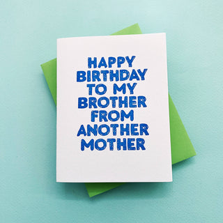 Happy Birthday To My Brother From Another Mother for guys - Holt x Palm -  Celebrating the men in our lives. Bro, guys or men, whatever you want to call it the guys deserve good greeting cards too. One color letterpress. Shown in neon blue ink with lime envelope. Our letterpress is printed on 100% cotton paper that is left over from the garment industry making it a green product. Printed in Long Beach Studio.