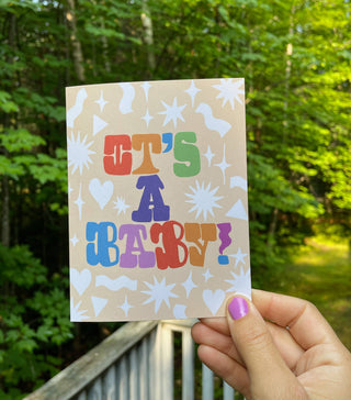 It's A Baby - Holt x Palm -  All of our cards are blank inside! That's so you can pour your little heart out as you wish and not have to deal with some lame saying on the inside....we totally hate that. And it also lets' you use the card for any occasion. Printed on 110lb. paper. Designed with love, creativity, and a sense of humor. You won't find this card at Target!