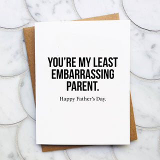 Least Embarrassing Parent - Funny Father's Day Card - Holt x Palm -  This cheeky card is printed on high quality card stock that makes the ink really pop. It comes gift ready, with a fabulous envelope and a clear sheath. The card measures 4.25 x 5.5 inches and is blank inside.