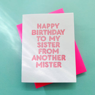 Happy Birthday Sister From Another Mister - Holt x Palm -  Celebrating our soul sisters, best friends and coworkers. One color letterpress card in a custom drawn font. Neon pink ink makes a happy and vibrant punch. One color letterpress dirty pink ink with neon pink envelope. One color letterpress with kraft envelope. Our letterpress is printed on 100% cotton paper that is left over from the garment industry making it a green product. Printed in Long Beach. CA